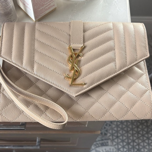Yves Saint Laurent Handbags - Yves Saint Laurent Tan Quilted Clutch